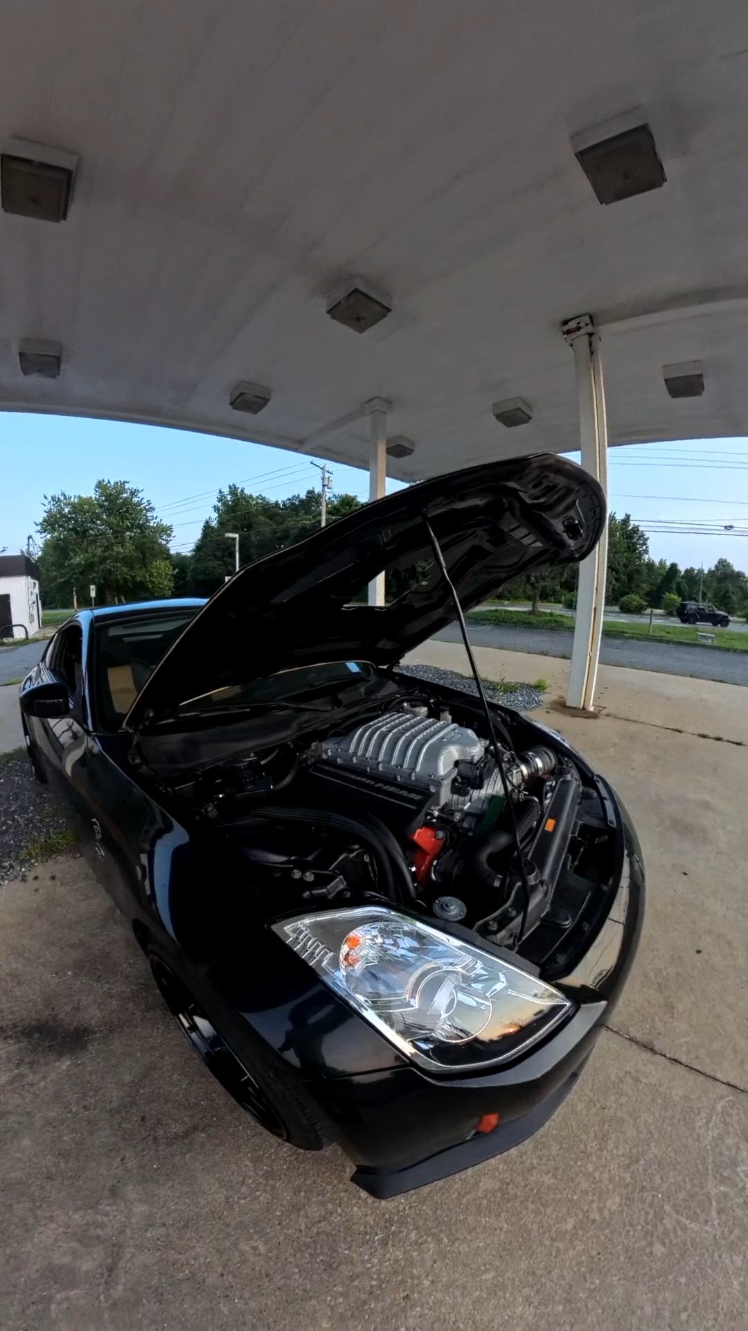 Engine bay with supercharger